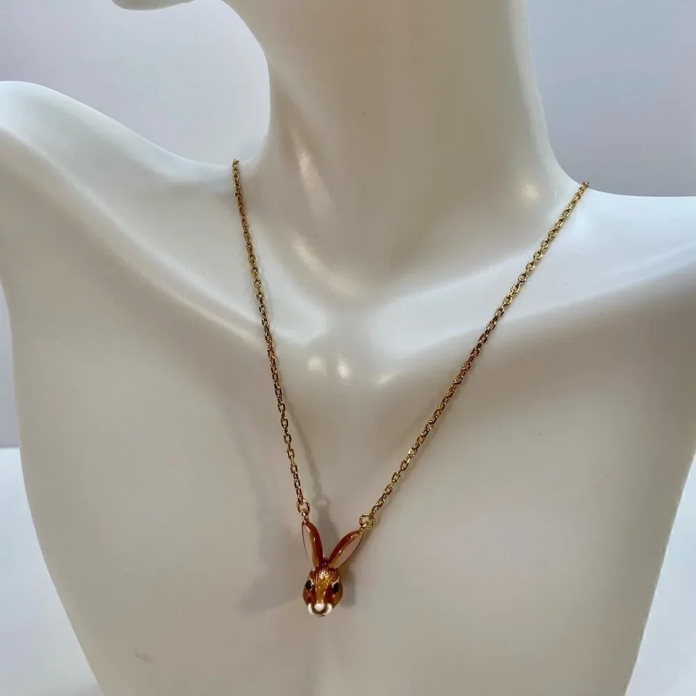 Kate Spade Desert Muse Pendant on delicate gold toned chain.